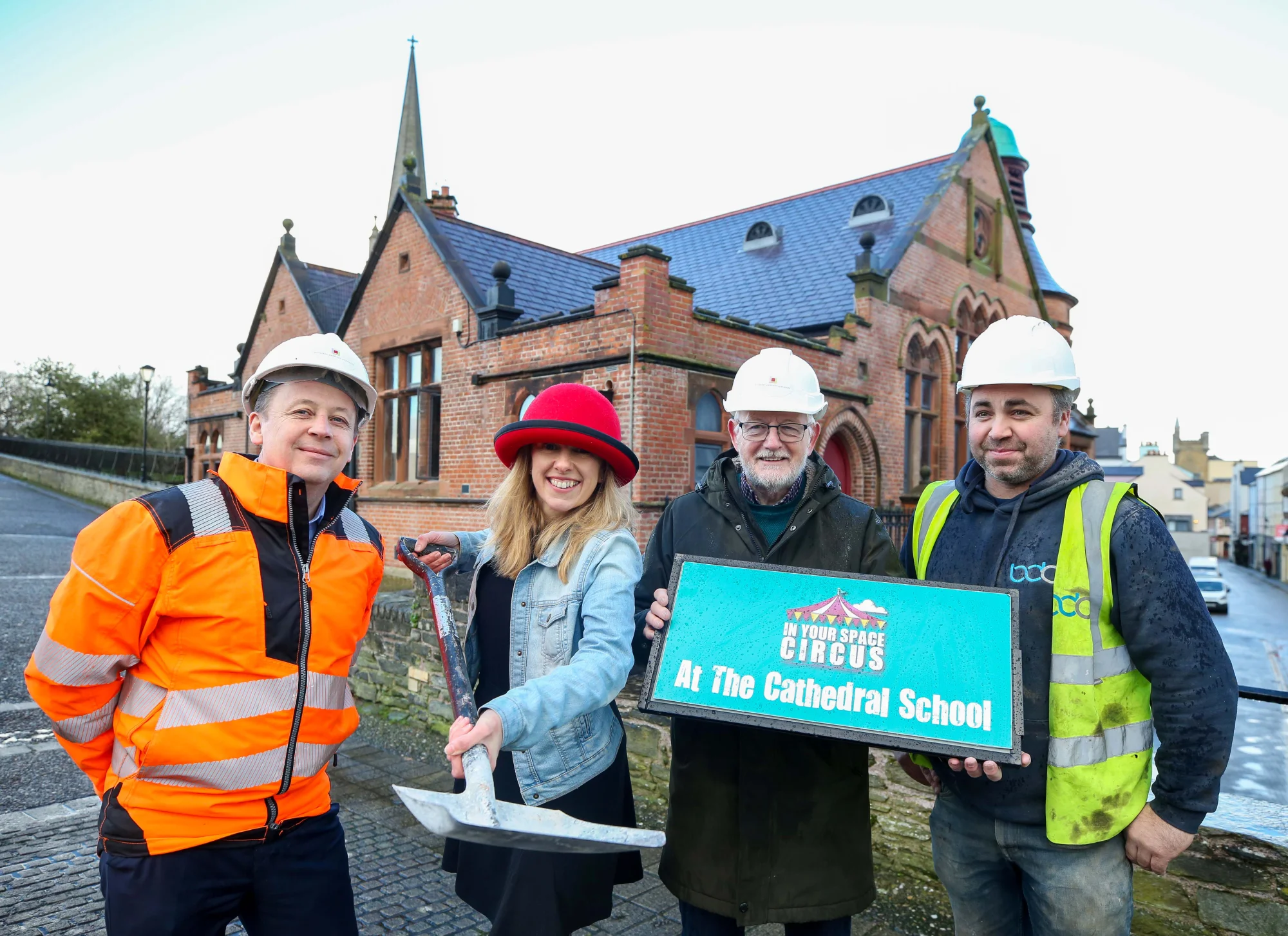 Photo shows Architect Karl Pedersen, IYSC Cath McBride, St. Columb's Cathedral Robert McGonigle and Building Contractor Brendan Doherty in front of the Cathedral School